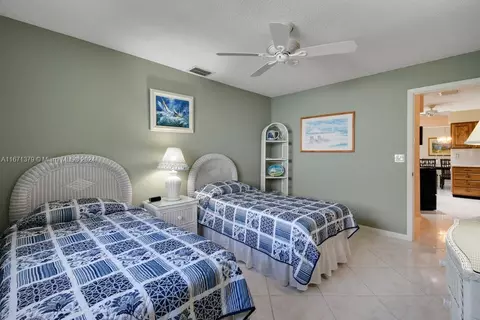Bedroom - 5169 SE Miles Grant Ter, Stuart, FL 34997 photo 3 of 6