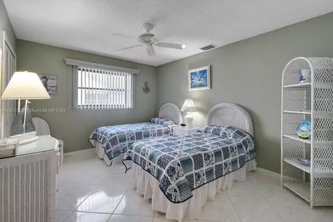 Bedroom - 5169 SE Miles Grant Ter, Stuart, FL 34997 photo 5 of 6