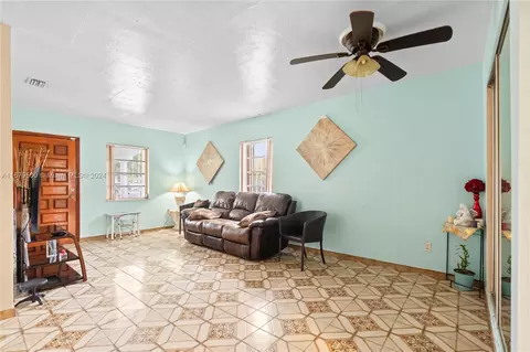 Living - 551 E 37th St, Hialeah, FL 33013 photo 2 of 4