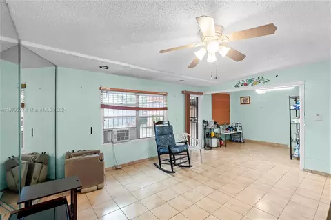 Living - 551 E 37th St, Hialeah, FL 33013 photo 4 of 4