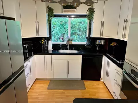 Kitchen - 296 Santander Ave, Coral Gables, FL 33134 photo 2 of 2