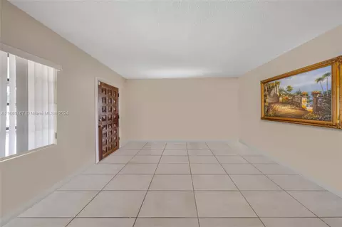 Living - 340 E 57th St, Hialeah, FL 33013 photo 3 of 4