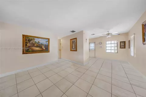 Living - 340 E 57th St, Hialeah, FL 33013 photo 2 of 4