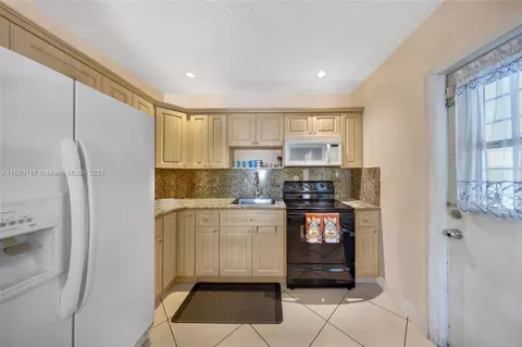 Kitchen - 340 E 57th St, Hialeah, FL 33013 photo 2 of 2