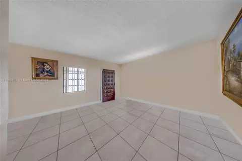 Living - 340 E 57th St, Hialeah, FL 33013 photo 4 of 4