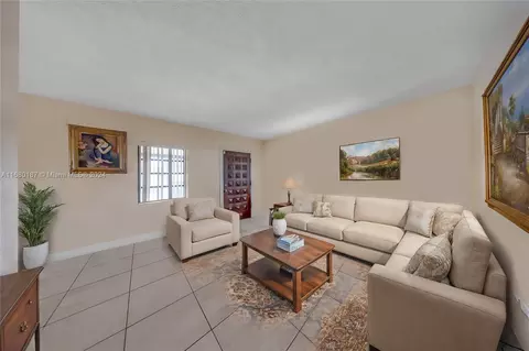 Living - 340 E 57th St, Hialeah, FL 33013 photo 1 of 4