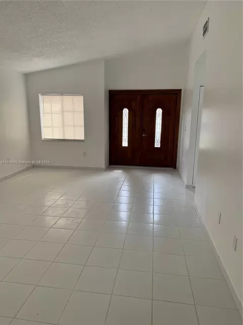 Living - 3127 W 69th Pl, Hialeah, FL 33018 photo 1 of 2