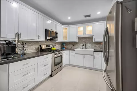 Kitchen - 496 W 46th Pl, Hialeah, FL 33012 photo 1 of 3
