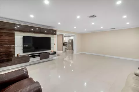 Living - 496 W 46th Pl, Hialeah, FL 33012 photo 1 of 2
