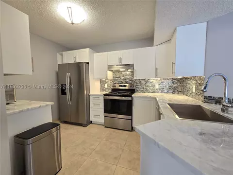 8977 Wiles Rd #304, Coral Springs, FL 33067