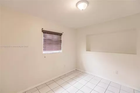 Bedroom - 521 E 41st St, Hialeah, FL 33013 photo 6 of 11