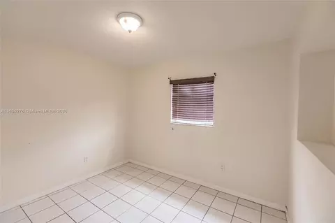 Bedroom - 521 E 41st St, Hialeah, FL 33013 photo 7 of 11