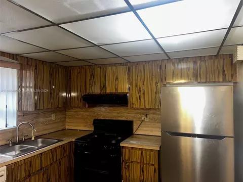 Kitchen - 439 E 16th St, Hialeah, FL 33010 photo 2 of 3
