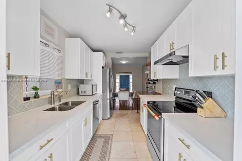 Kitchen - 520 E 33rd St, Hialeah, FL 33013 photo 1 of 2