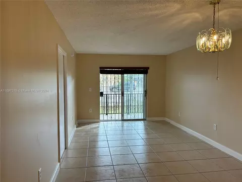 Living - 3181 SW 13th St #111, Miami, FL 33145 photo 1 of 3