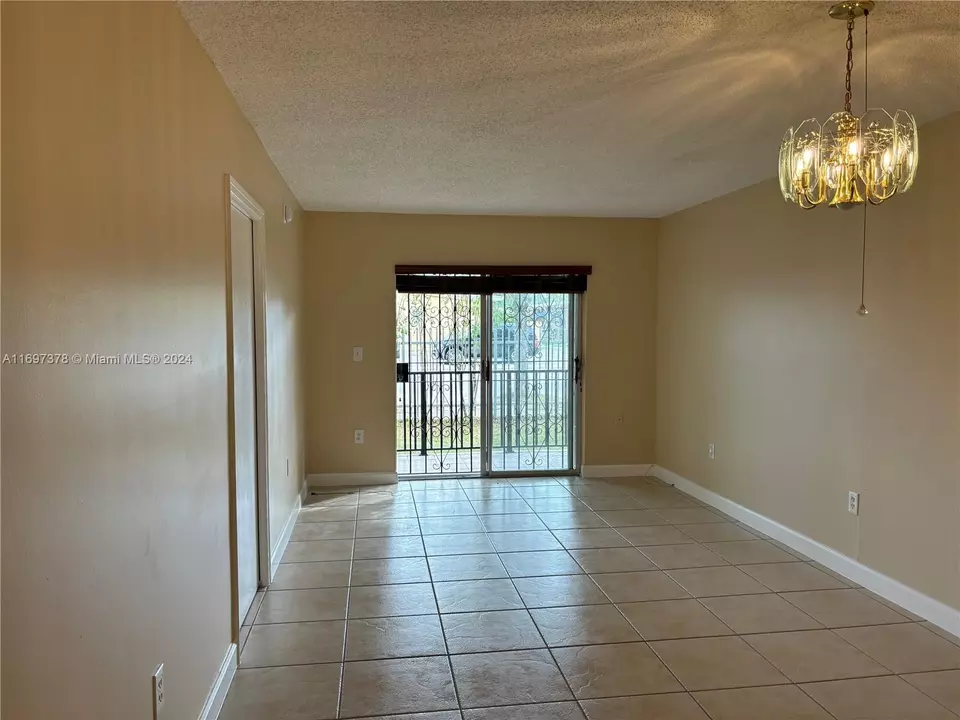Living - 3181 SW 13th St #111, Miami, FL 33145 photo 1 of 3