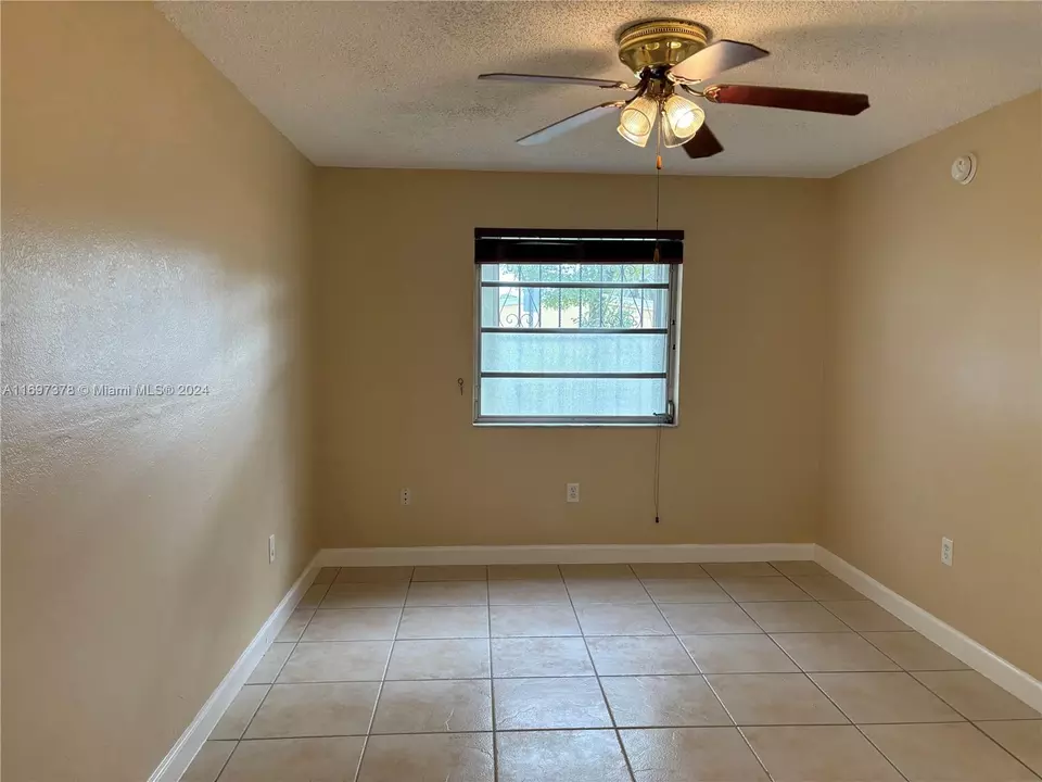 Living - 3181 SW 13th St #111, Miami, FL 33145 photo 2 of 3