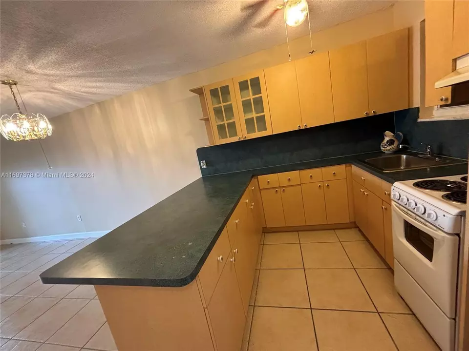 Kitchen - 3181 SW 13th St #111, Miami, FL 33145 photo 2 of 4