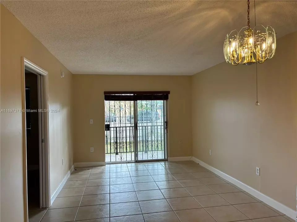 Living - 3181 SW 13th St #111, Miami, FL 33145 photo 3 of 3