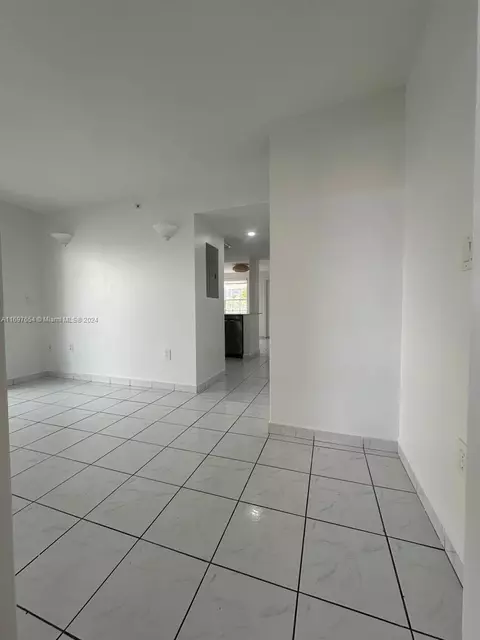 Living - 9 E 4th St #204, Hialeah, FL 33010 photo 2 of 3
