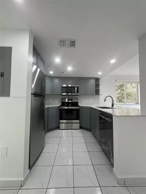 Kitchen - 9 E 4th St #204, Hialeah, FL 33010 photo 3 of 3