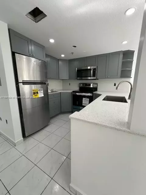 Kitchen - 9 E 4th St #204, Hialeah, FL 33010 photo 2 of 3