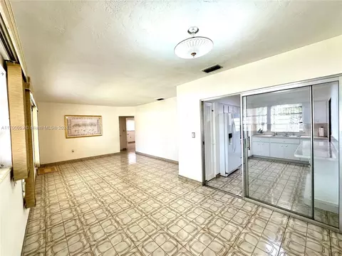 Living - 480 W 37th St, Hialeah, FL 33012 photo 9 of 10