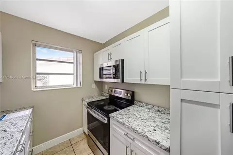 Kitchen - 270 E 63rd St, Hialeah, FL 33013 photo 2 of 2