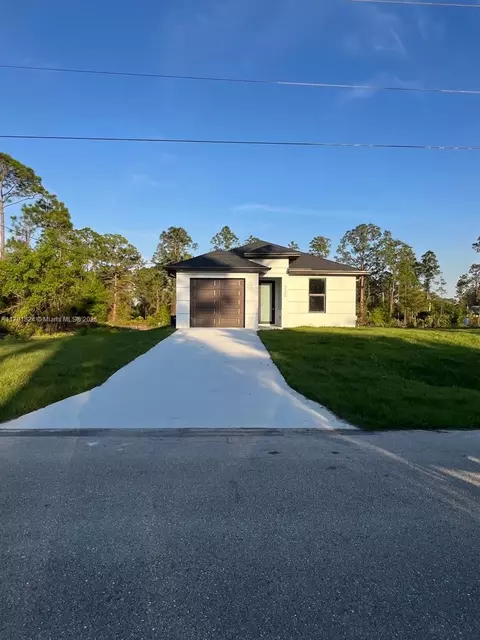 225 Bowman Ave S, Lehigh Acres, FL 33974