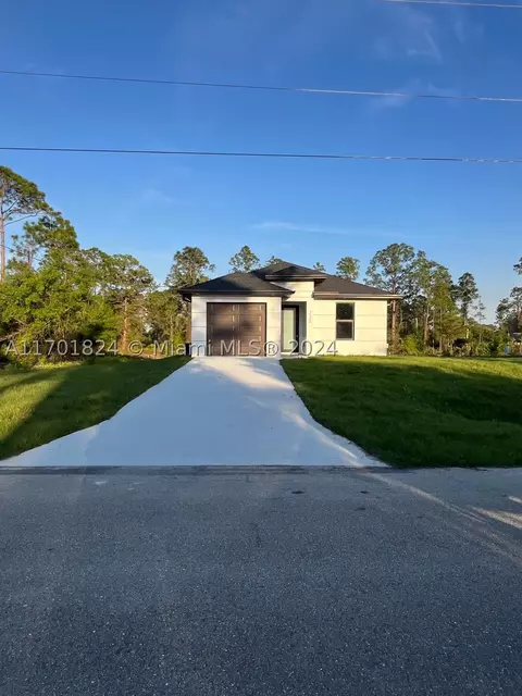 225 Bowman Ave S, Lehigh Acres, FL 33974