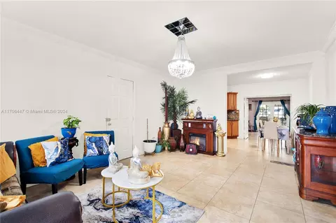 Living - 703 E 37th St, Hialeah, FL 33013 photo 1 of 1