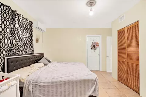Bedroom - 703 E 37th St, Hialeah, FL 33013 photo 5 of 7