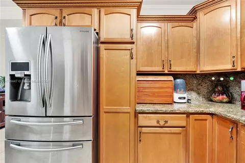 Kitchen - 703 E 37th St, Hialeah, FL 33013 photo 3 of 4