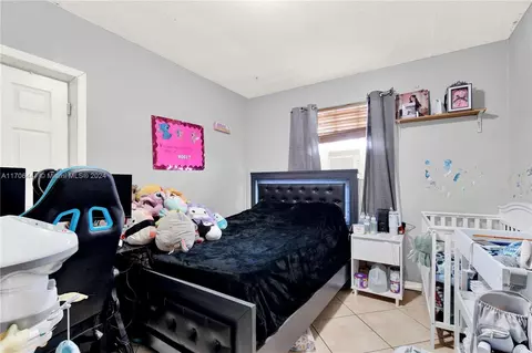 Bedroom - 703 E 37th St, Hialeah, FL 33013 photo 3 of 7