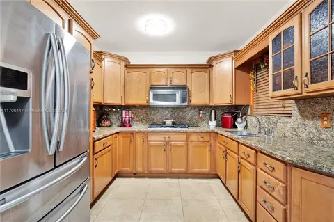 Kitchen - 703 E 37th St, Hialeah, FL 33013 photo 1 of 4