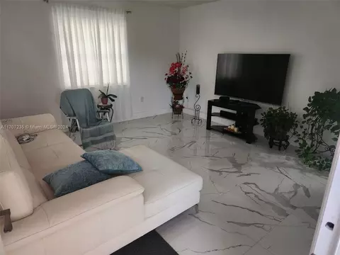 Living - 1725 W 58th St, Hialeah, FL 33012 photo 1 of 2
