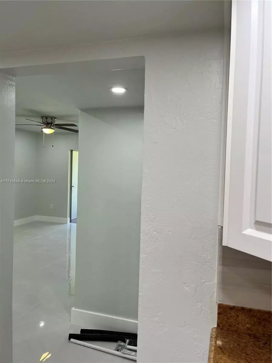 Entry Way - 15888 SW 95th Ave #305, Miami, FL 33157 photo 1 of 3