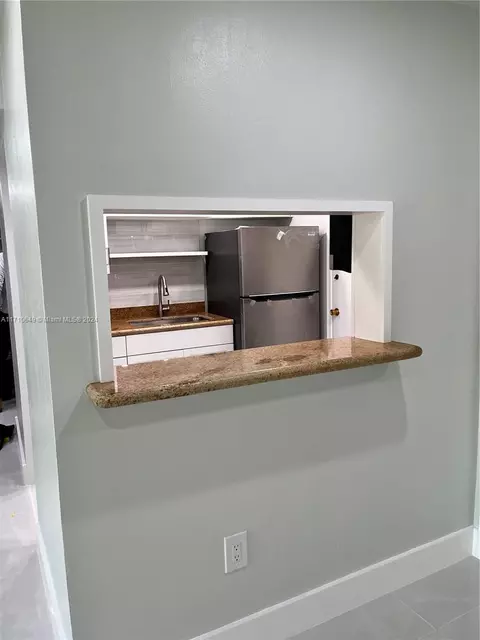 Kitchen - 15888 SW 95th Ave #305, Miami, FL 33157 photo 1 of 3