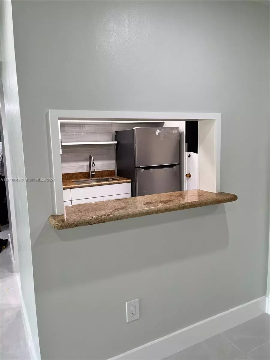 Kitchen - 15888 SW 95th Ave #305, Miami, FL 33157 photo 1 of 3