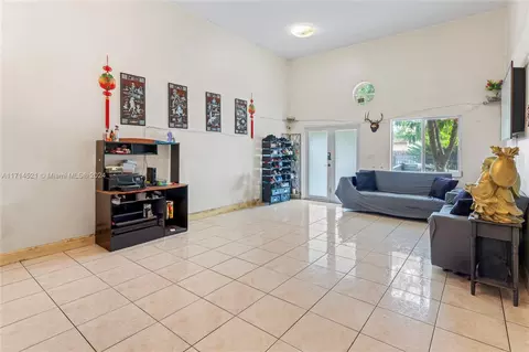 Living - 7050 W 4th Ln, Hialeah, FL 33014 photo 2 of 3