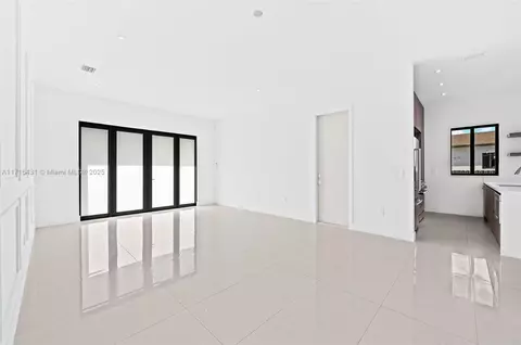 Living - 715 E 56th St, Hialeah, FL 33013 photo 3 of 4