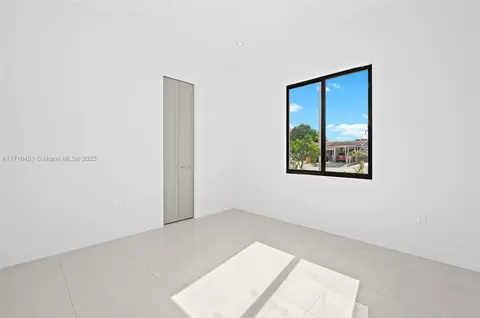 Bedroom - 715 E 56th St, Hialeah, FL 33013 photo 5 of 6