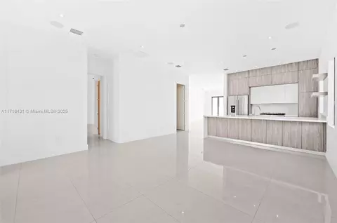 Living - 715 E 56th St, Hialeah, FL 33013 photo 4 of 4