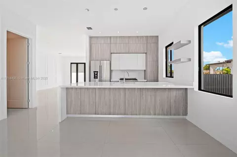 Kitchen - 715 E 56th St, Hialeah, FL 33013 photo 3 of 4