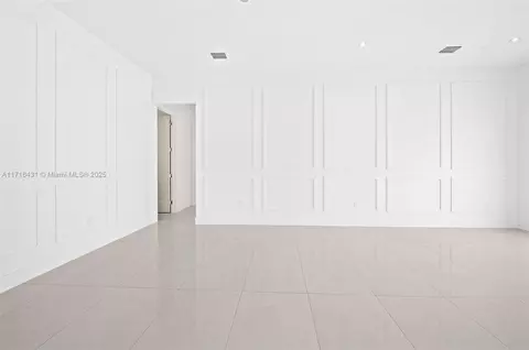 Living - 715 E 56th St, Hialeah, FL 33013 photo 2 of 4