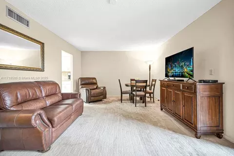 Living - 915 W 80th Pl, Hialeah, FL 33014 photo 3 of 3