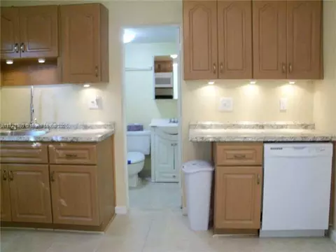 Kitchen - 800 Phippen Waiters Rd, Dania Beach, FL 33004 photo 1 of 1