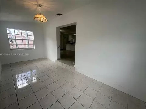 Living - 101 E 41st St, Hialeah, FL 33013 photo 2 of 4