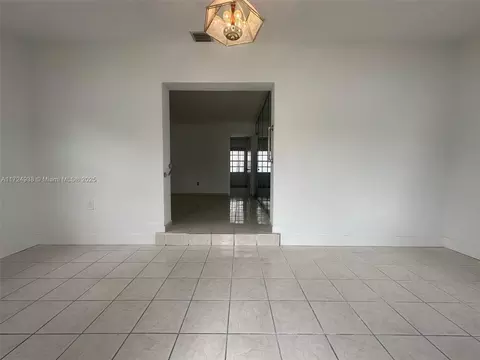 Living - 101 E 41st St, Hialeah, FL 33013 photo 1 of 4