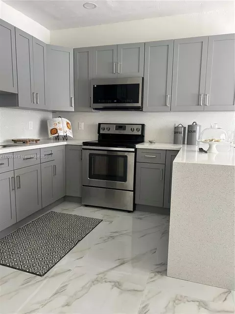 Kitchen - 437 W 76th St, Hialeah, FL 33014 photo 1 of 5